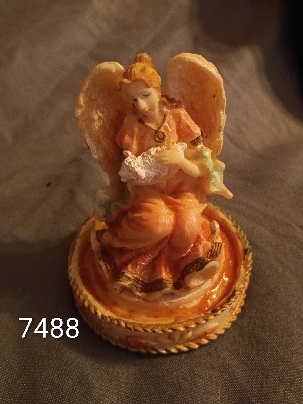 Angel Holding Lamb Figurine
